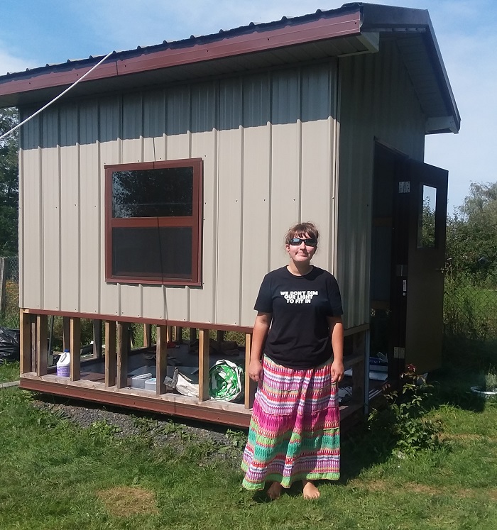 Student with Building She Constructed