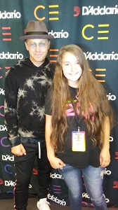 A student posing with Toby Mac